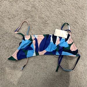 Cute patterned swim top from Lively. Size large. New with tags.